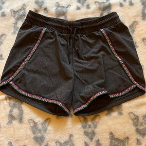 Athleta Girl shorts in dark grey with a cute colorful trim. Size XL/14